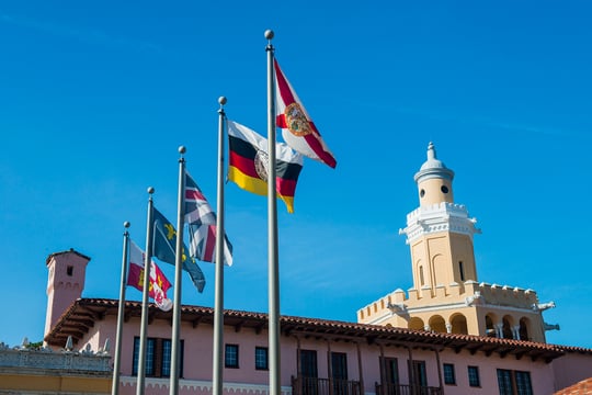 Various flags hoisted outside Stetson